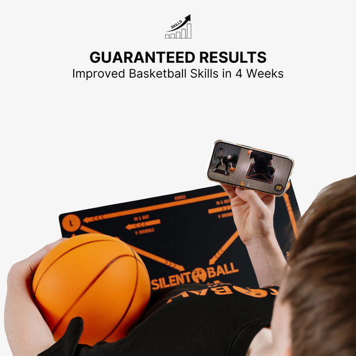 A vertical shot of a child standing on the SilentBall training mat, focused on a smartphone displaying the SilentBall Academy app