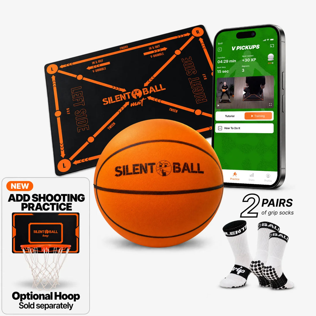 Silent Ball basketball training kit featuring an orange basketball, a black practice mat with orange markings, a smartphone showing the training app, and two pairs of black-and-white grip socks on a light gray background.