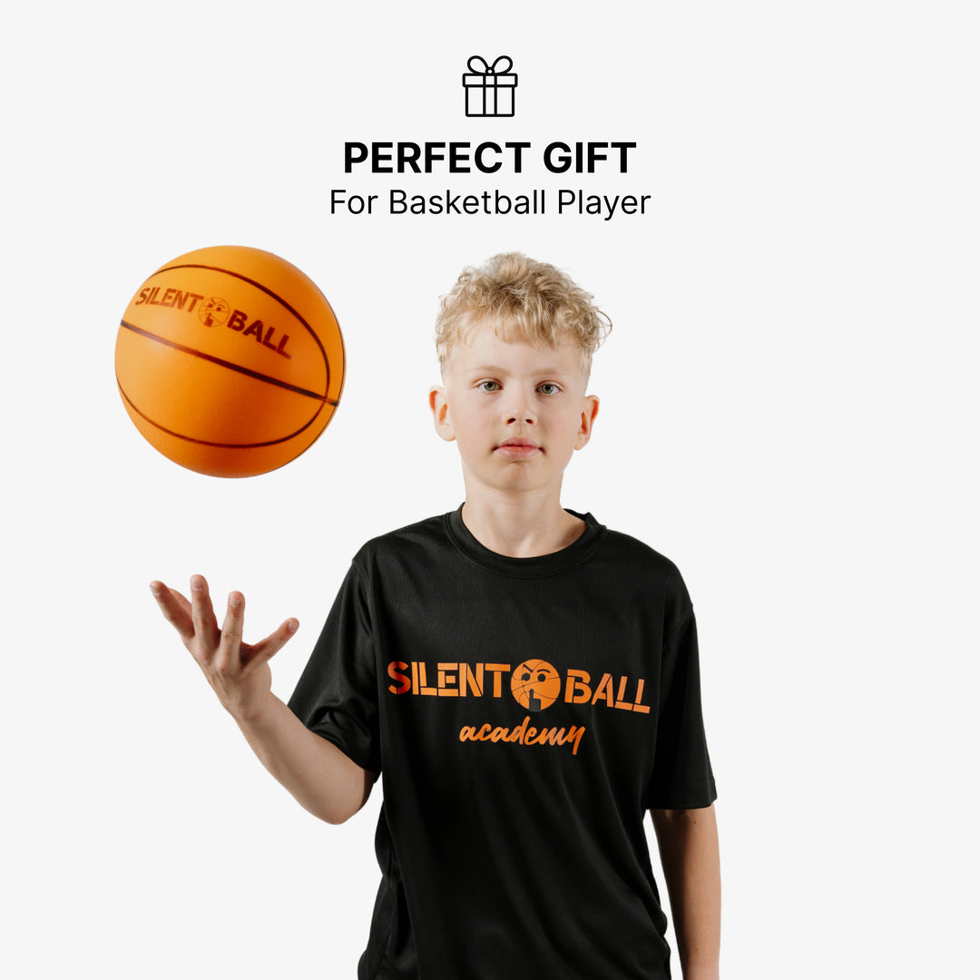 A smiling child holding or interacting with SilentBall Academy products, with accompanying text 'Perfect Gift,' emphasizing the joy and suitability of the products as a present