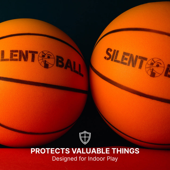 Two SilentBalls positioned protectively near valuable household items, metaphorically guarding them while showcasing their quiet presence in a home setting