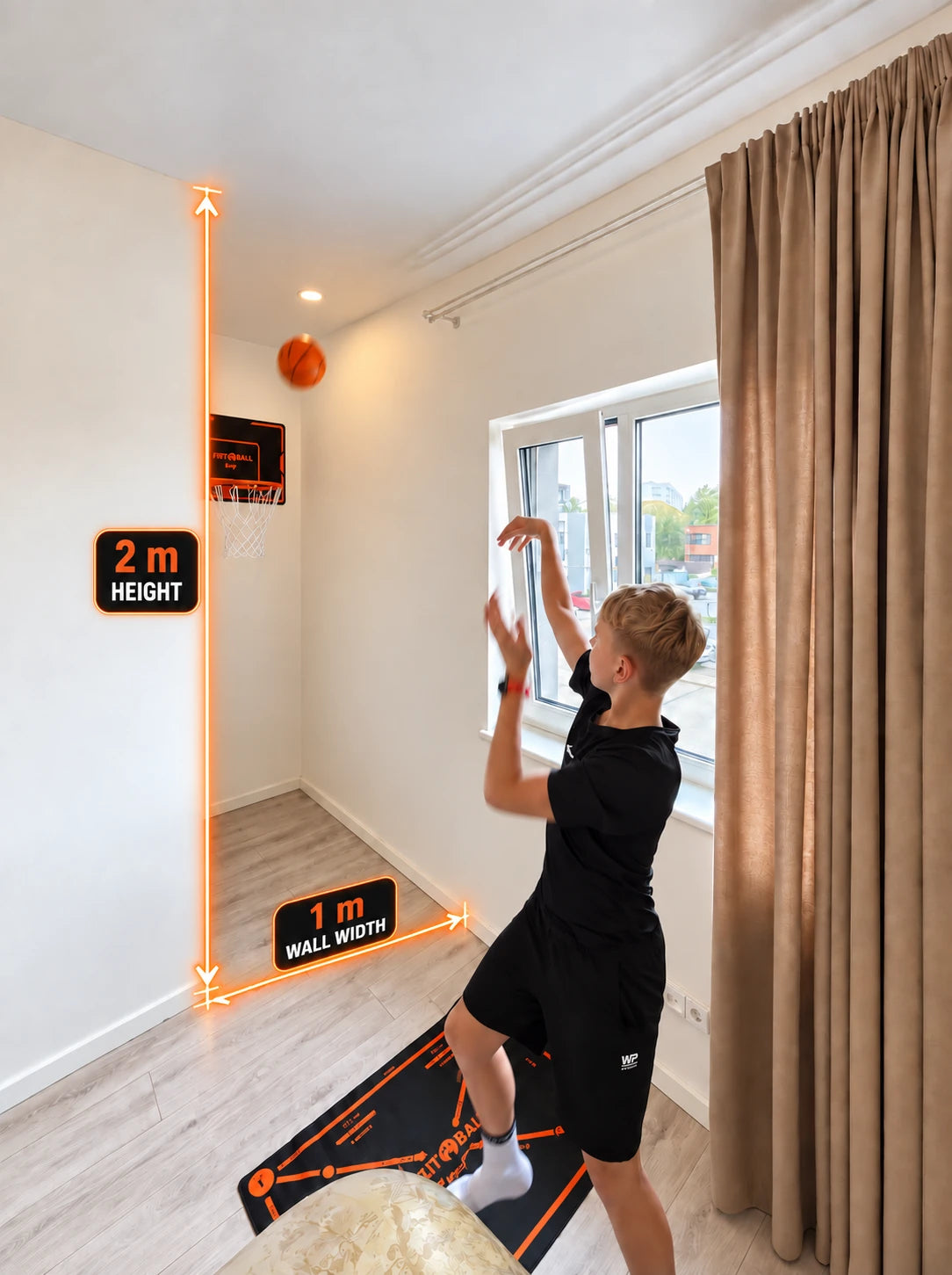 A boy in a black shirt and shorts stands in a room aiming a basketball toward a small wall-mounted hoop. Orange measurement overlays show the hoop height as 2 meters and the wall width as 1 meter.